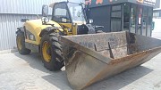 Телескопический погрузчик CAT TH407